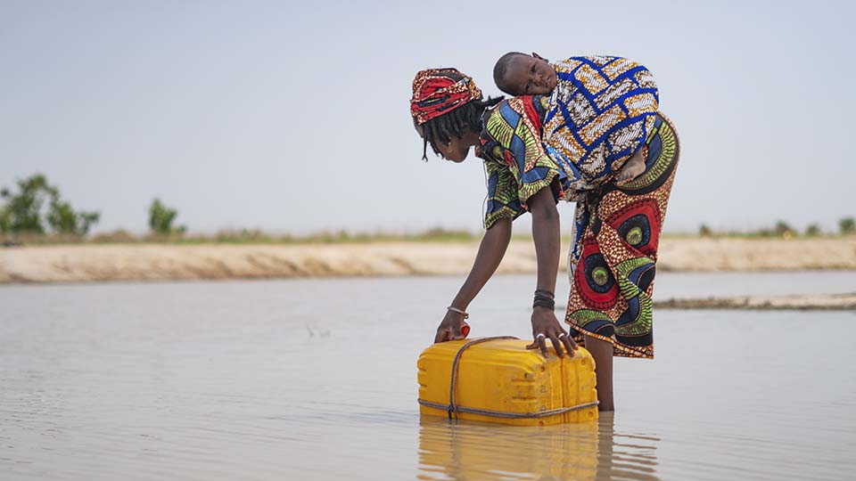 collecting water in Nigeria