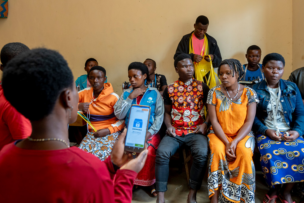 A group of people sitting in a room.