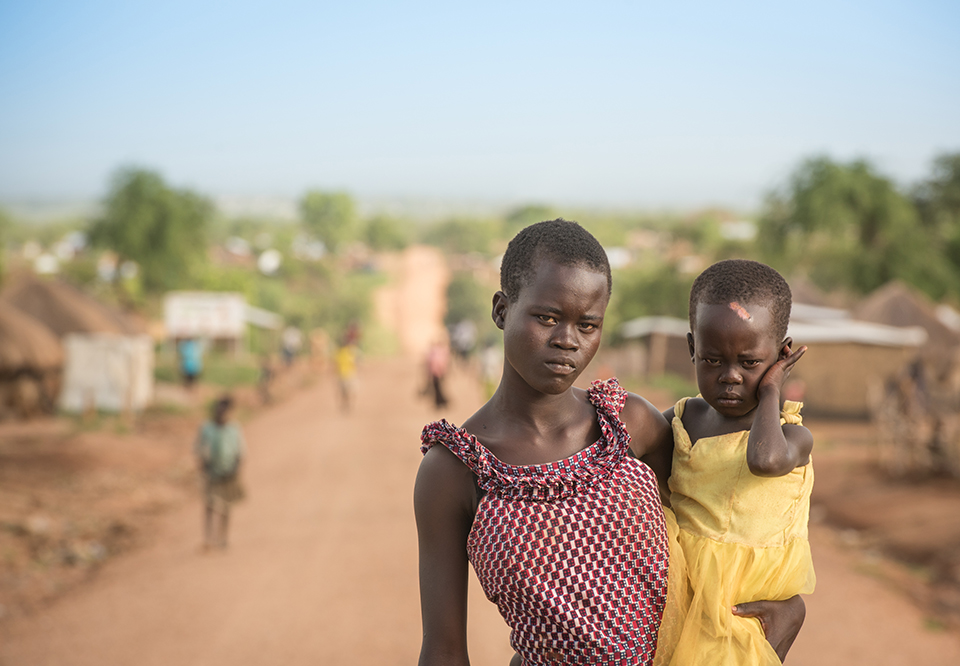 This photo is part of CRS' best photos of 2018, it's a refugee family in Bidi Bidi camp in Uganda.