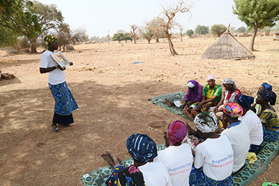 Care groups empower women to solve community problems. Photo by Michael Stulman/CRS