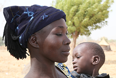 Bikiega Adjirata leads a care group to promote better nutrition and health. Photo by Michael Stulman/CRS