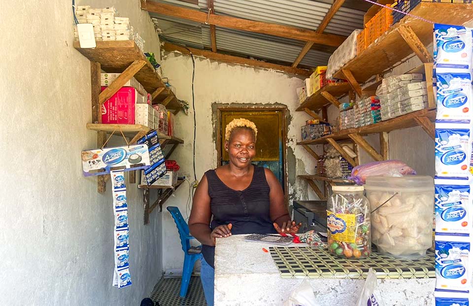 business owner in her shop in Liberia