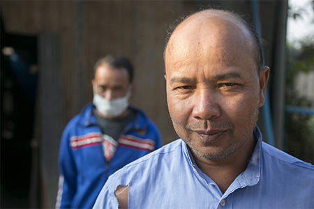 Sovanna stepped in to help his brother Bung recover from tuberculosis, and with support from CRS, the whole family is now growing stronger. Photo by Jennifer Hardy/CRS Sovanna stepped in to help his brother Bung recover from tuberculosis, and with support from CRS, the whole family is now growing stronger. Photo by Jennifer Hardy/CRS