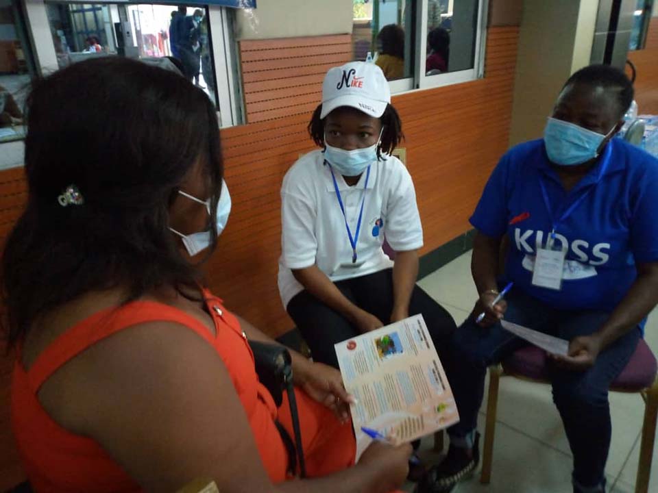 Cameroon caseworkers wearing masks