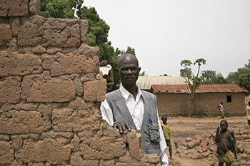 CRS has helped Marcaisse Ngoget, a village chief in Central African Republic whose home was destroyed in violent conflict, restore peace. Photo by Michael Stulman/CRS