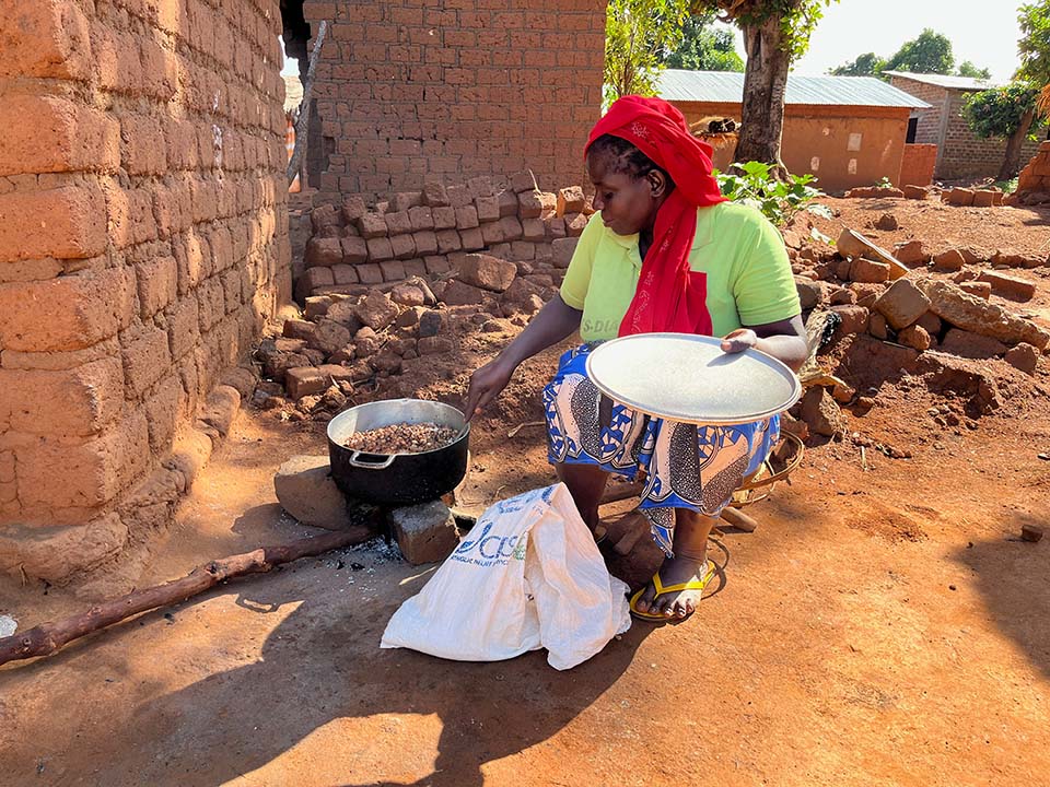 woman prepares breakfast in Central African Republic