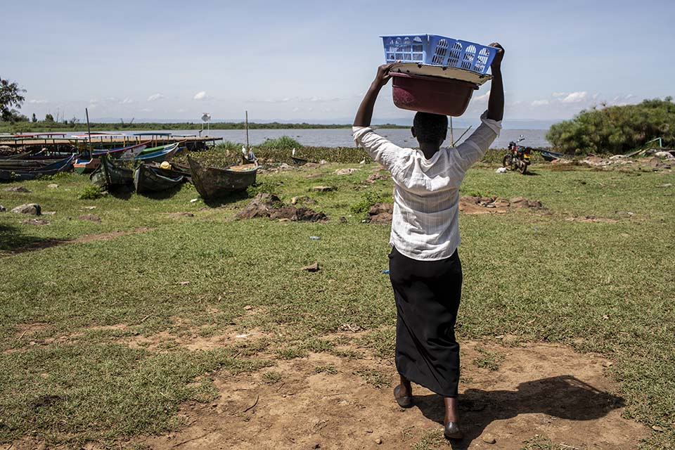 carrying fish to market in Kenya