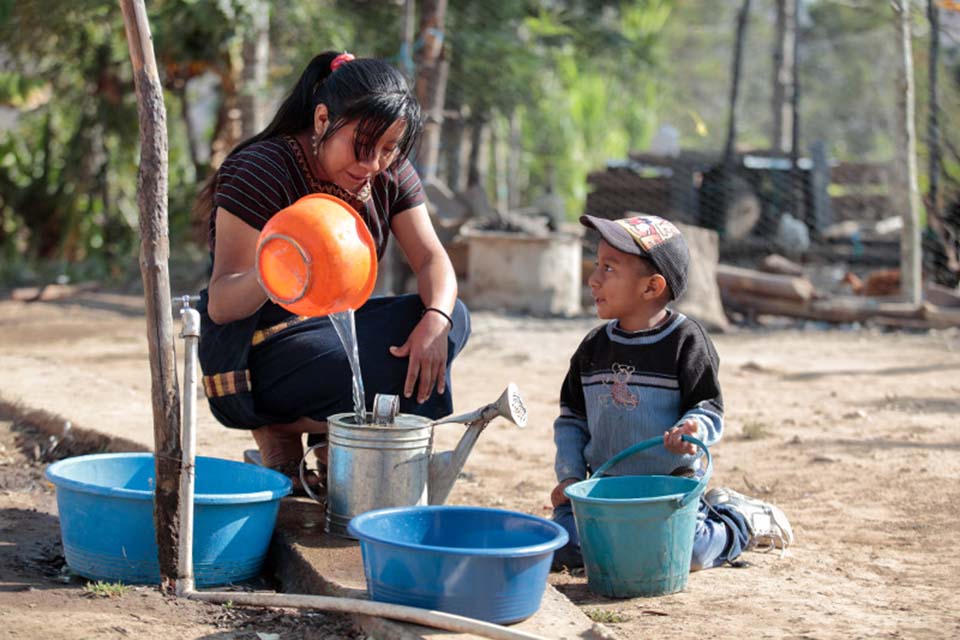 collecting water in Guatemala