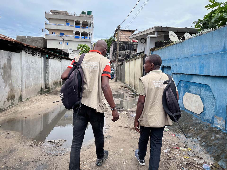 healthcare workers walk in Republic of Congo