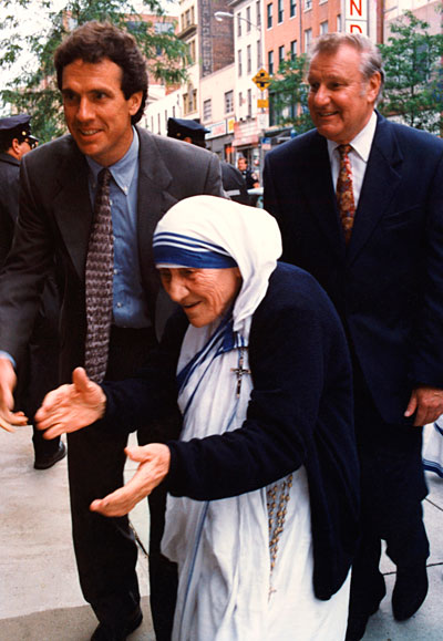 Mother Teresa visits CRS headquarters in 1996 accompanied by her friend Sean Callahan, left, and an unidentified man from her entourage. Photo by CRS staff