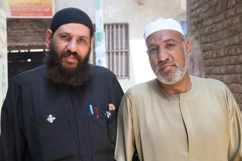 Sheikh Moustafa, right, is grateful that Father Rueis—after participating in the CRS program TA'ALA—took the first step toward rebuilding peace amid local conflict. Photo by Nikki Gamer/CRS