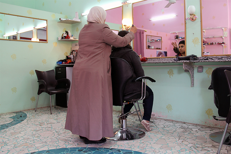 Photo by Nikki Gamer/CRS Wafa, a Syrian, opened a salon with CRS’ help. “I’m so proud that I can cover my family’s expenses. One of the best feelings is knowing that I don’t need anyone to give me money; I don’t need help from anyone,” she says.