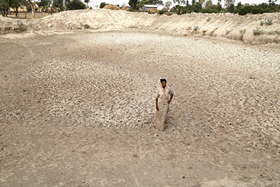 Ethiopia faces its worst drought in 50 years. Following a dry 2015, the effects of climate change and El Nino continue to include a devastating lack of water that could last for much of 2016. Photo by Nancy McNally/CRS