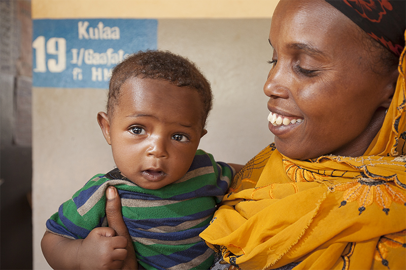 Photo by Petterik Wiggers for CRS Kadija Abdelahi with her son, Amar Yusuf, 6 months. During worst drought in 50 years, Kadija has learned from a trained health worker the benefits of breastfeeding.