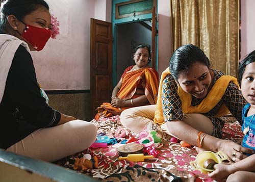 family in India sitting together