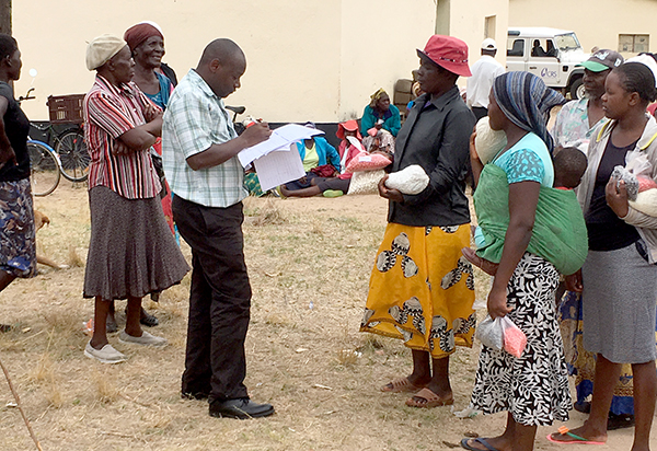 farmers in Zimbabwe receiving seed