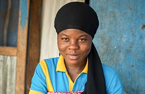 mother in Ghana facing the camera