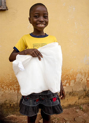 young girl with bed net