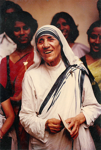 Mother Teresa holds a letter telling her the news that she has won the Nobel Peace Prize. 