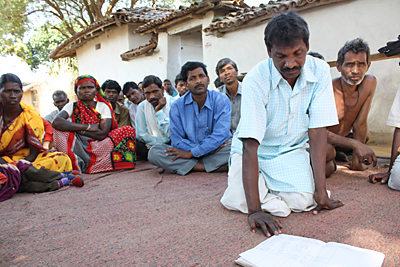 To curb human trafficking, residents of an isolated community in India keep a register of people who are leaving for big cities. Photo by Laura Sheahen/CRS