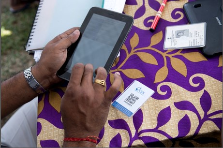 Cards with a QR code enable CRS volunteers to fulfill requests for relief supplies quickly. Photo by Jennifer Hardy/CRS