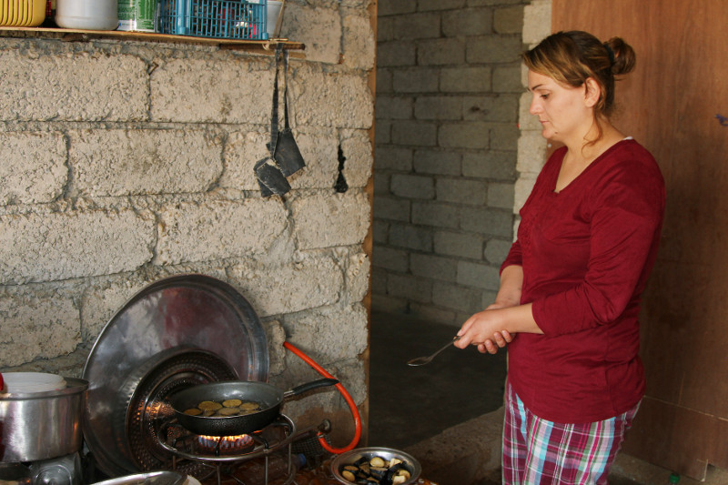 "When CRS installed windows and doors we felt safe to live here. Before there was nothing. It was like a ghost house," says Wesal Badel. Photo by Kim Pozniak/CRS