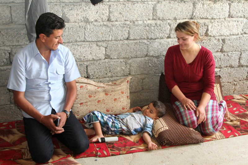 Wesal Badel, her husband, Dakheel, and their 3-year-old son were forced from their home by ISIS. The family now lives in an unfinished home in Iraqi Kurdistan that CRS and our partner Caritas Iraq upgraded with windows and doors. Photo by Kim Pozniak/CRS