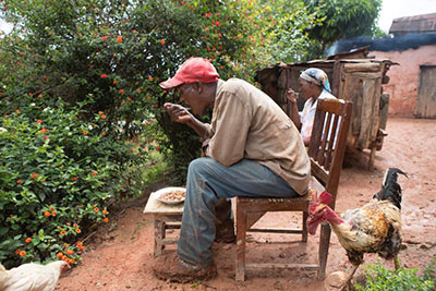 David Wambugu and his wife, Virginia, who has tuberculosis, can eat more than one meal a day thanks to the new farming techniques, goats and financing a CRS project provided. Photo by Sara A. Fajardo/CRS
