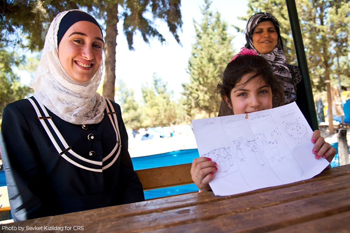 Syrian refugee Malak has been working as a teacher in in Turkey. Like her, her students are Syrian refugees, who have lost their homes. CRS is assisting the Syrian people in transit all through the region.