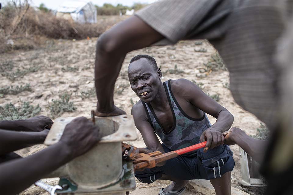 mechanics fix well pump in South Sudan