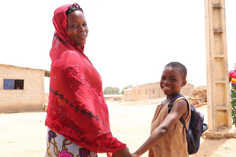 mother and daughter face camera in Benin