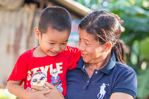 moher with her child in Vietnam