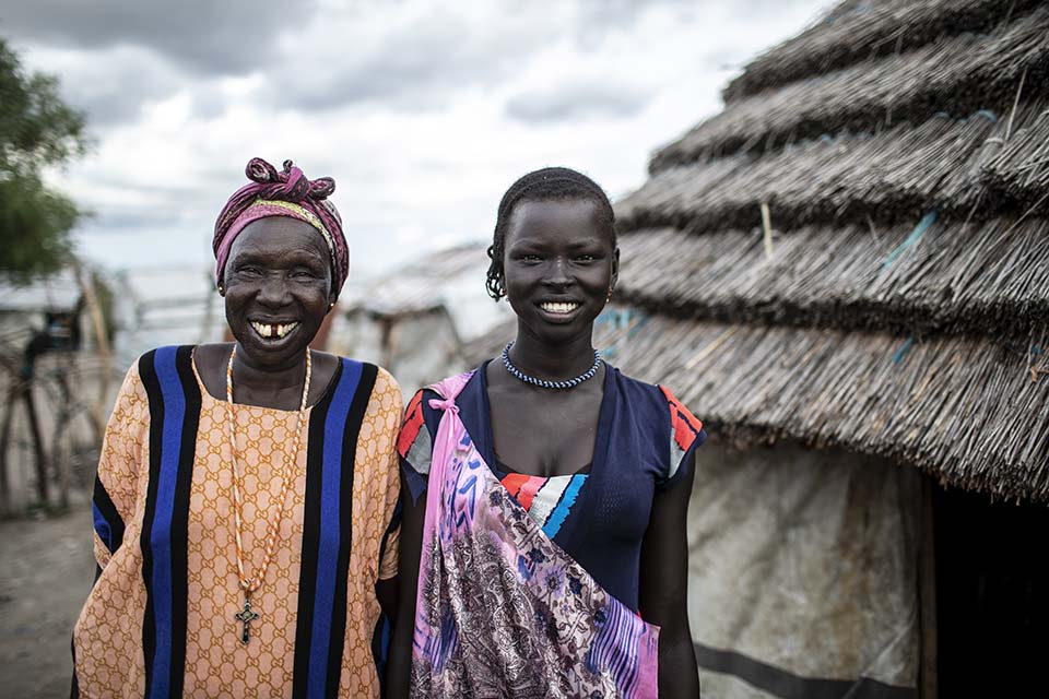 mother-in-law stands next to her daughter-in-law in South Sudan
