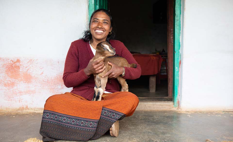 Nepal woman with goat
