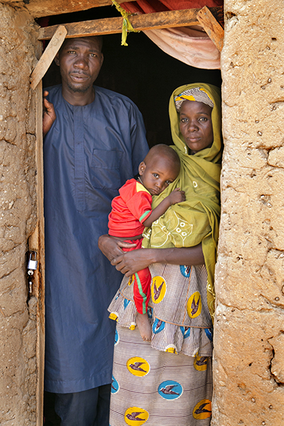 Nigerien families like Abdou Bydum and his wife Kolema Boucar, who have been sheltering Boko Haram survivors at their own expense, are now receiving cash-for-work aid from CRS. Photo by Michael Stulman/CRS