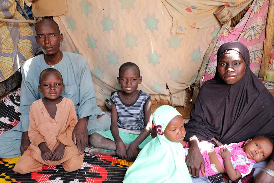 Niger family seated together