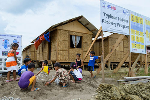 After Typhoon Haiyan devastated central Philippines on November 8, 2013, one of the ways CRS helped families and communities was with storm-resistant shelters. Those shelters survived this year's Typhoon Hagupit. Photo by Charlie David Martinez for CRS