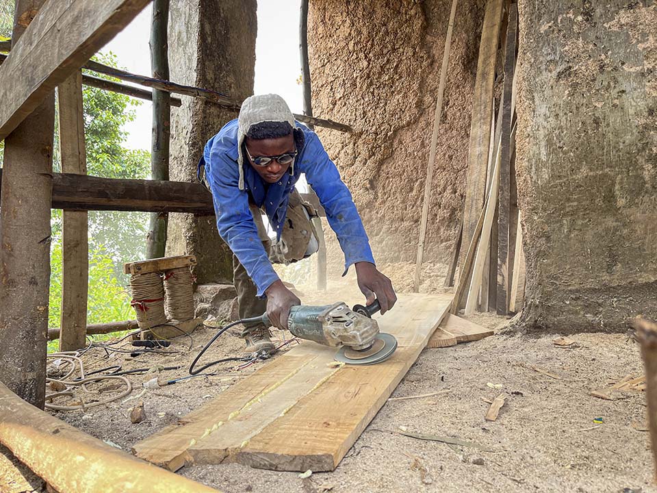 sanding board in Rwanda carpentry shop