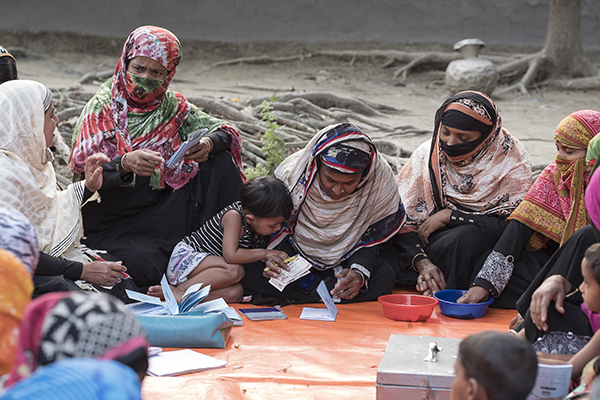 women in CRS savings-led microfinance group