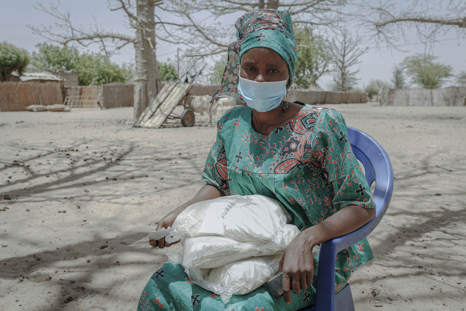 Senegal mother with food supplies
