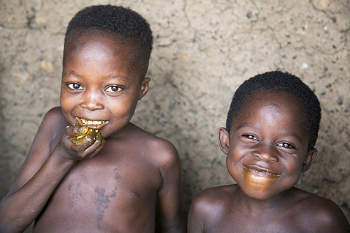 Children benefited from cash assistance CRS distributed to more than 4,000 families to invest in their farms and buy food. Photo by Michael Stulman/CRS