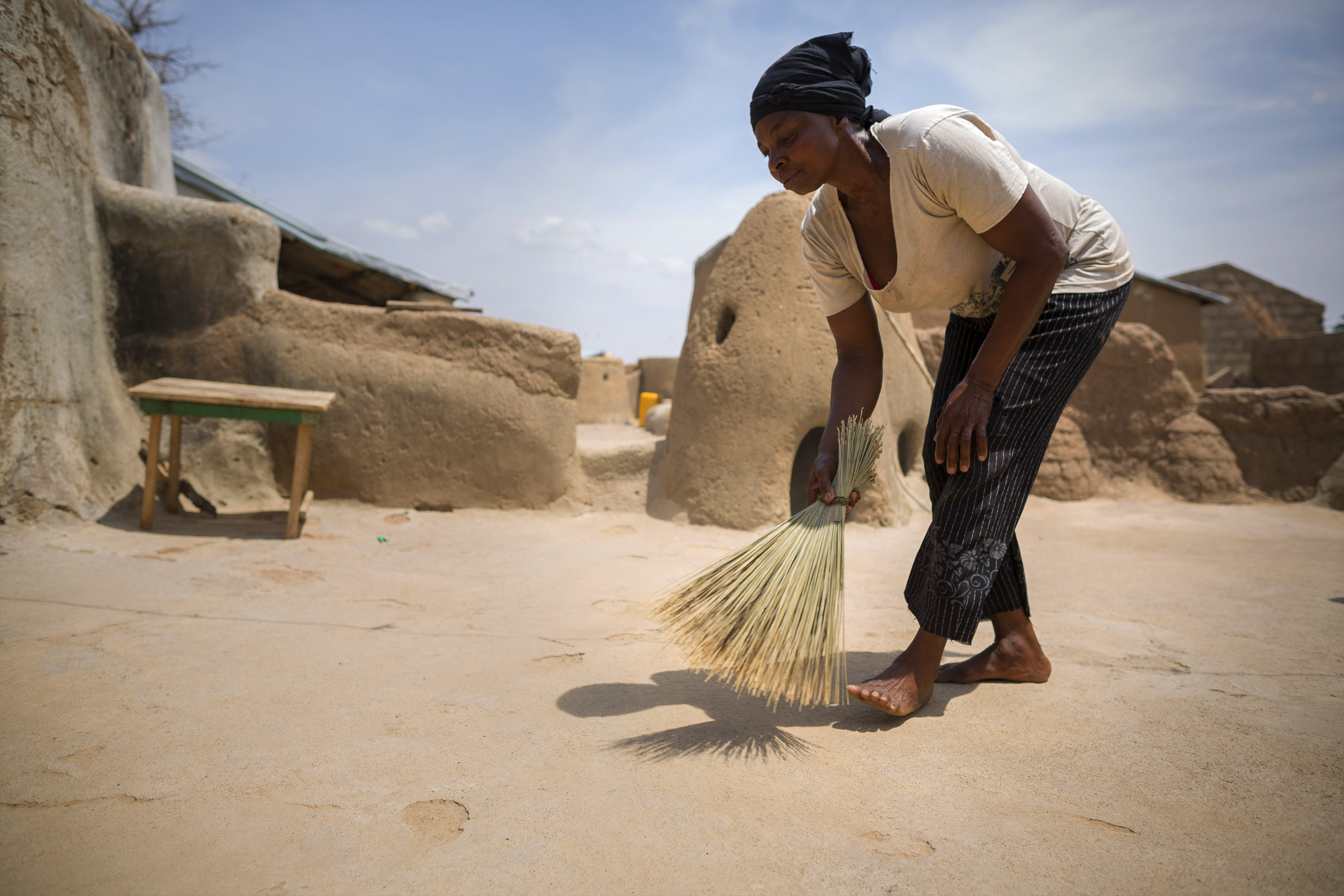 Farmers in Ghana have had their crop investments washed out by floods only to see their land taken by drought almost every second or third year. Photo by Jake Lyell for CRS