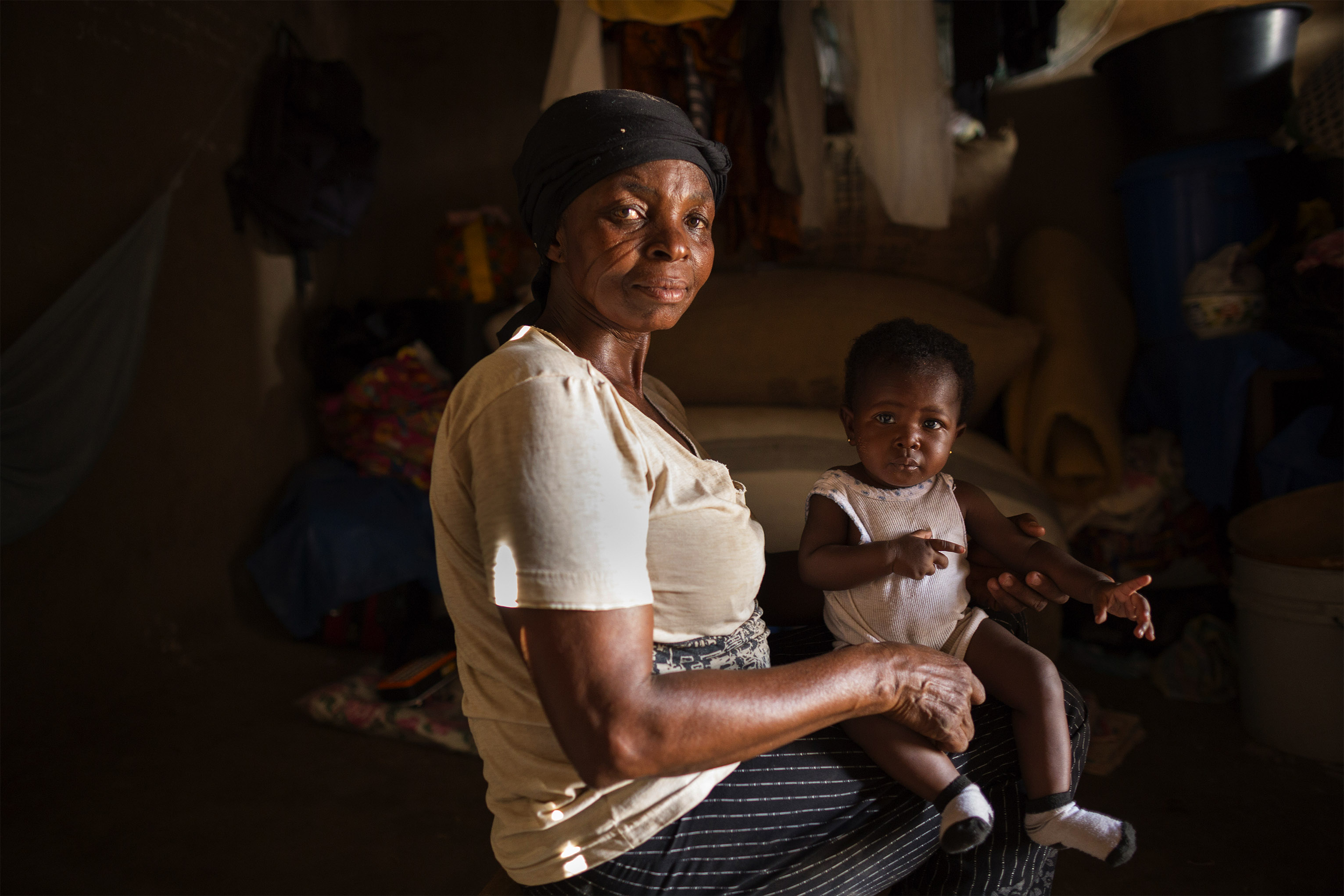 The ability to earn money through farming is Ghana is often limited because of climate change. But women like Rita are using earnings from the CRS’ savings groups to start a shea nut butter business. Photo by Jake Lyell for CRS