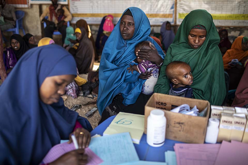 Somalia mother and child visit a health clinic