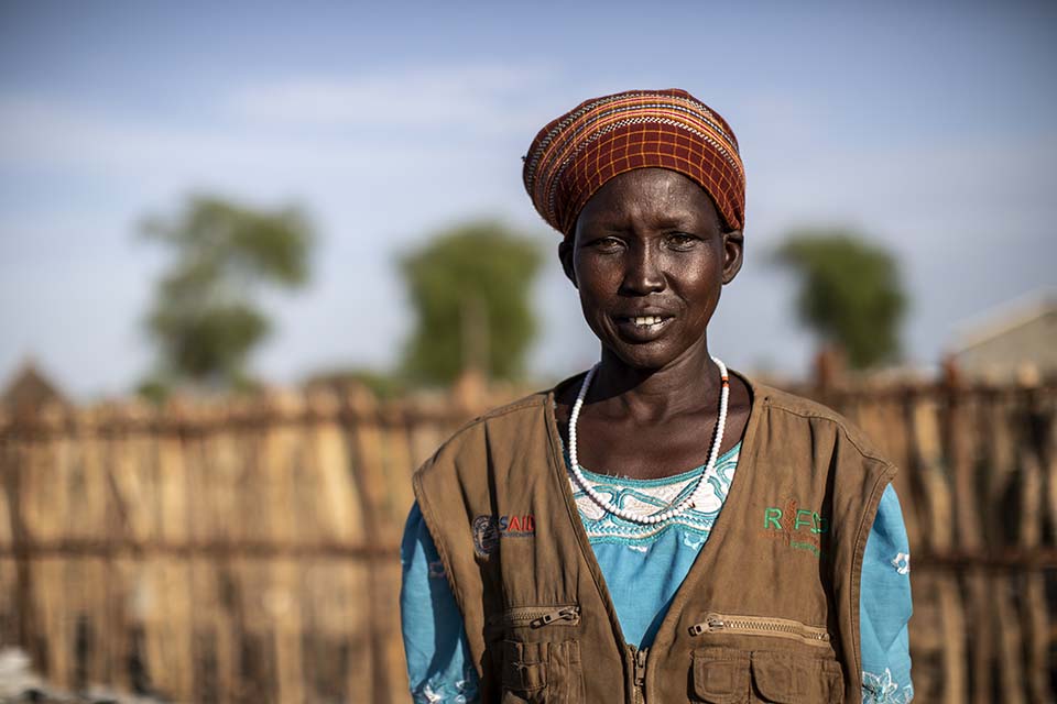 South Sudanese committee member facing camera