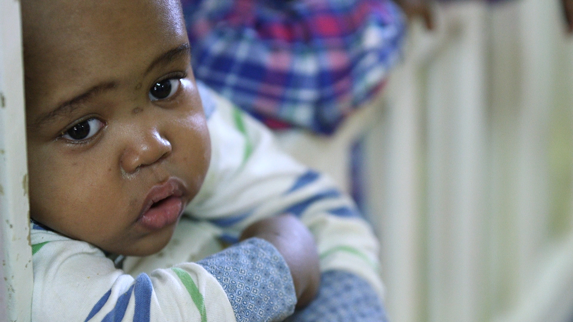 About 80-90% of the 8 million children living in orphanages worldwide have a living parent. Photo by Vivid Features for CRS About 80-90% of the 8 million children living in orphanages worldwide have a living parent. Photo by Vivid Features for CRS