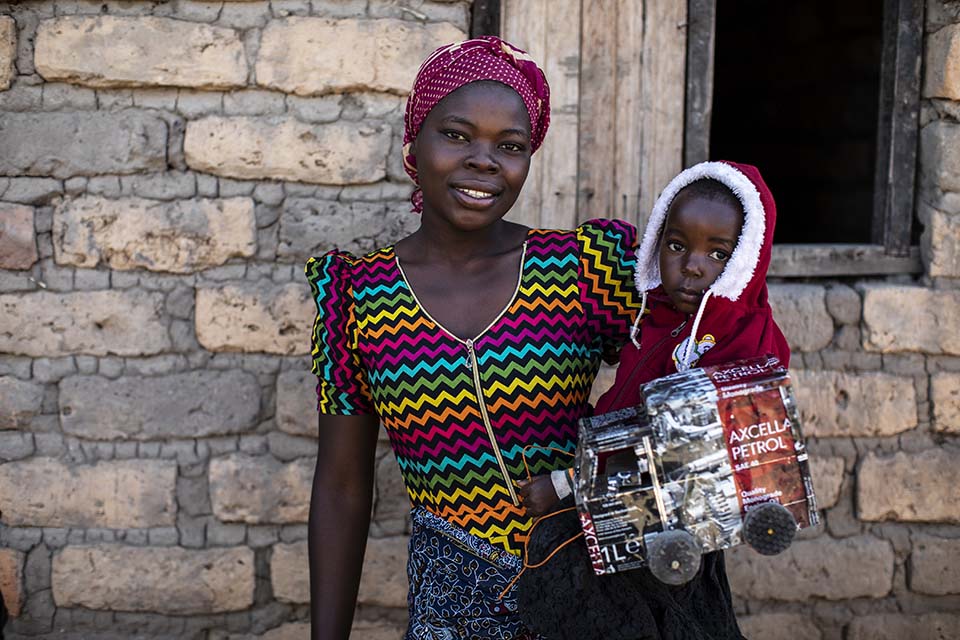 Tanzanian mother holding her child