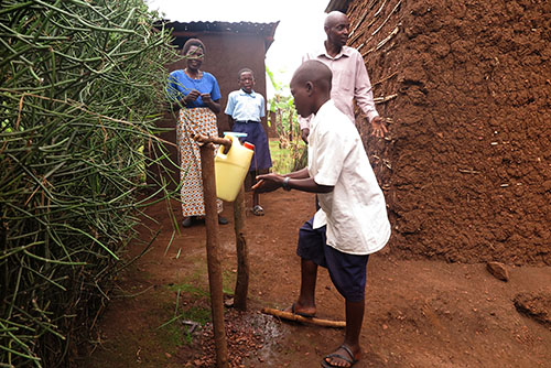 tippy tap improves family hygiene in Rwanda