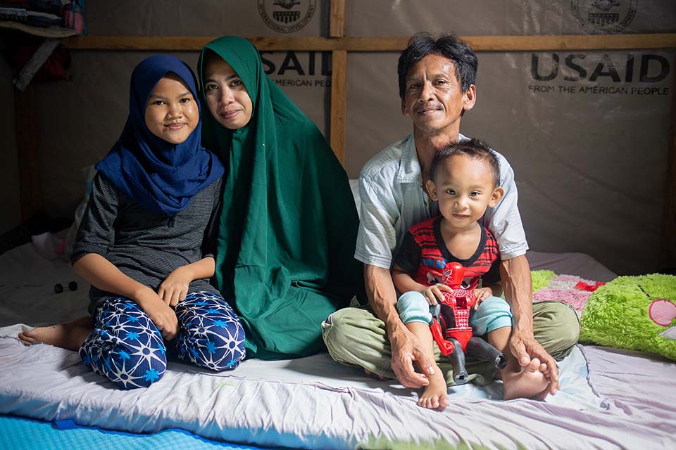 tsunami survivors in shelter