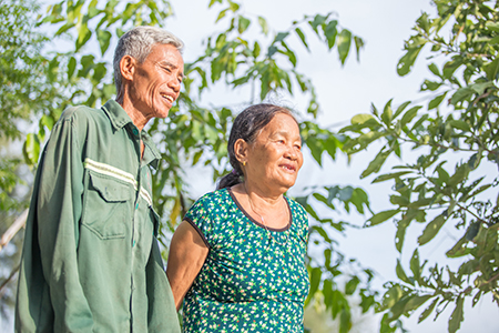 Photo by Lisa Murray for CRS Tue’s increased yields have also meant more income to spend on medicine for his wife Bui Thi Lien.